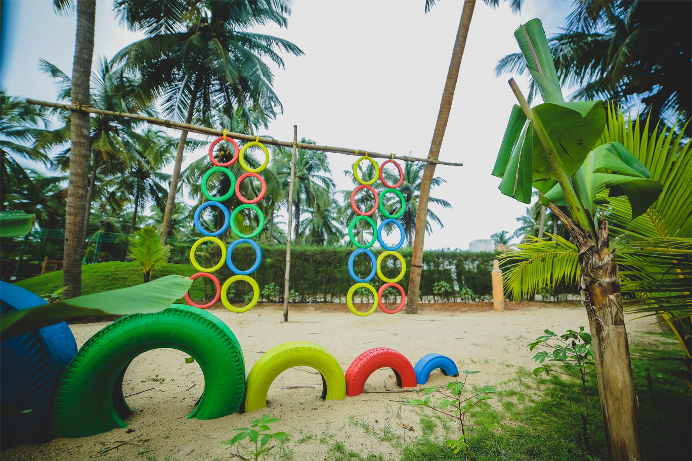 guests enjoing at cheshire village,Kerala beach resorts